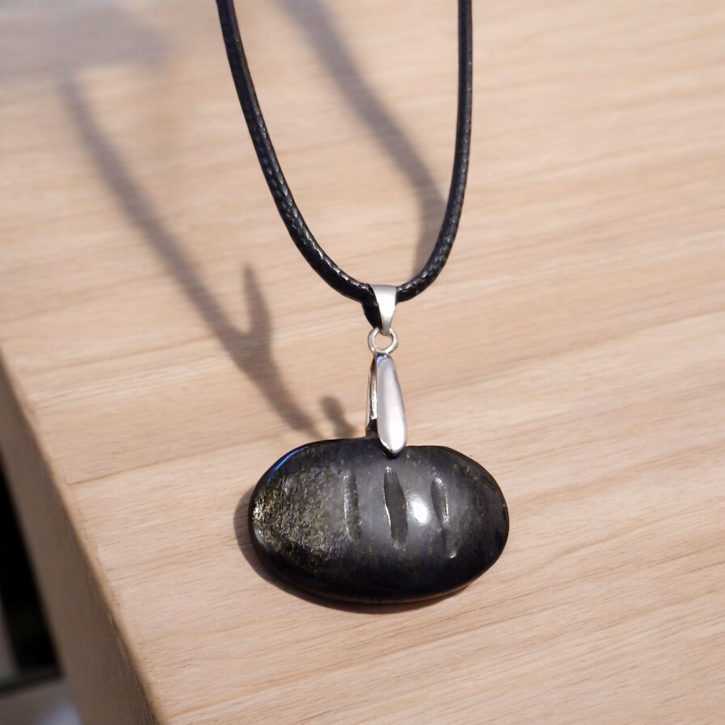 Pendentif Obsidienne dorée