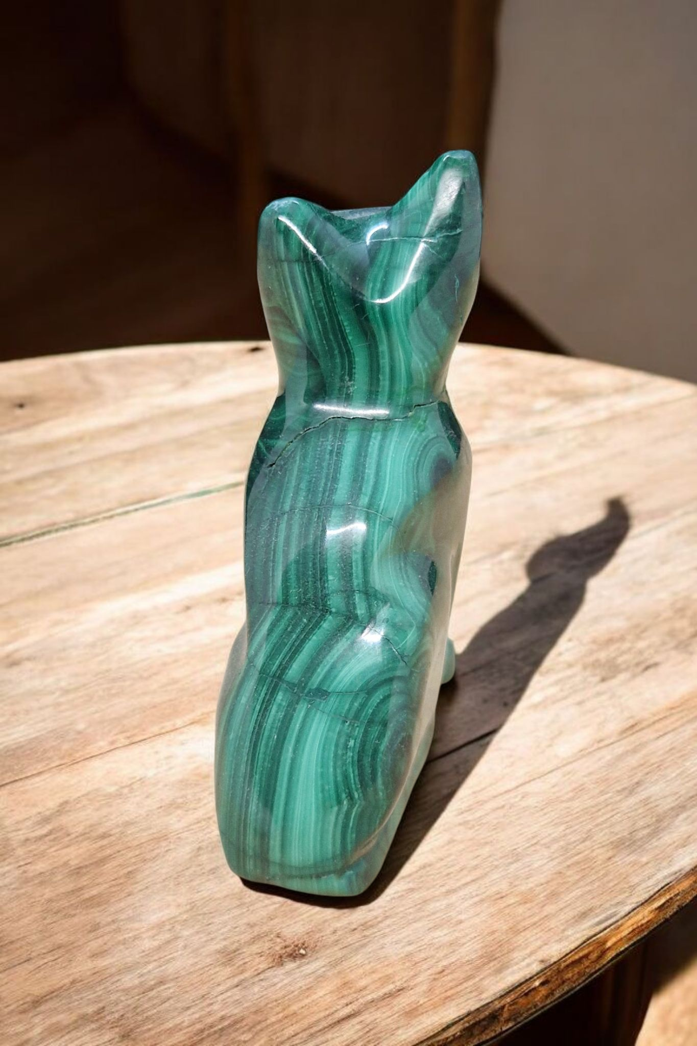 Chat en Malachite