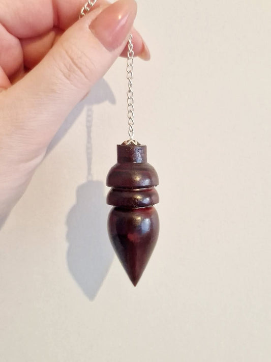 Pendule en bois de rose