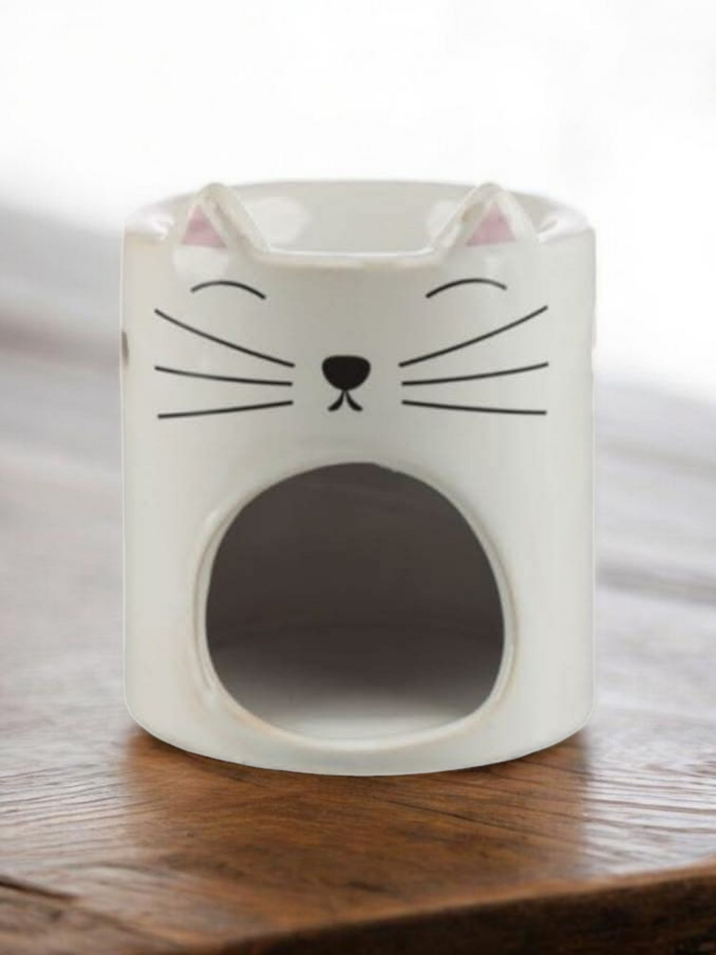 Brûleur chat blanc