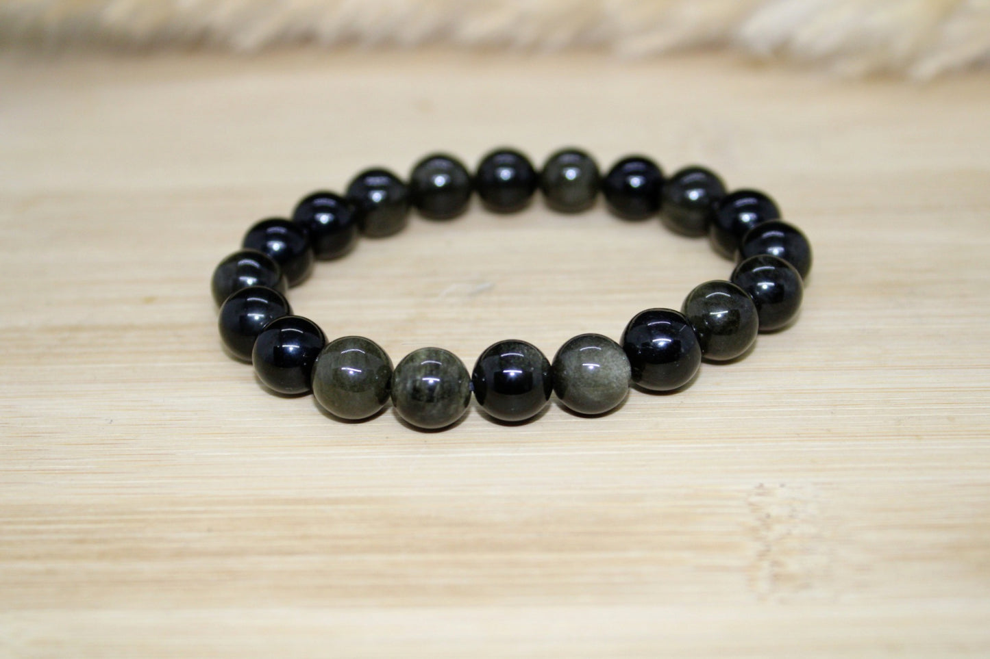 Bracelet Obsidienne dorée 10mm