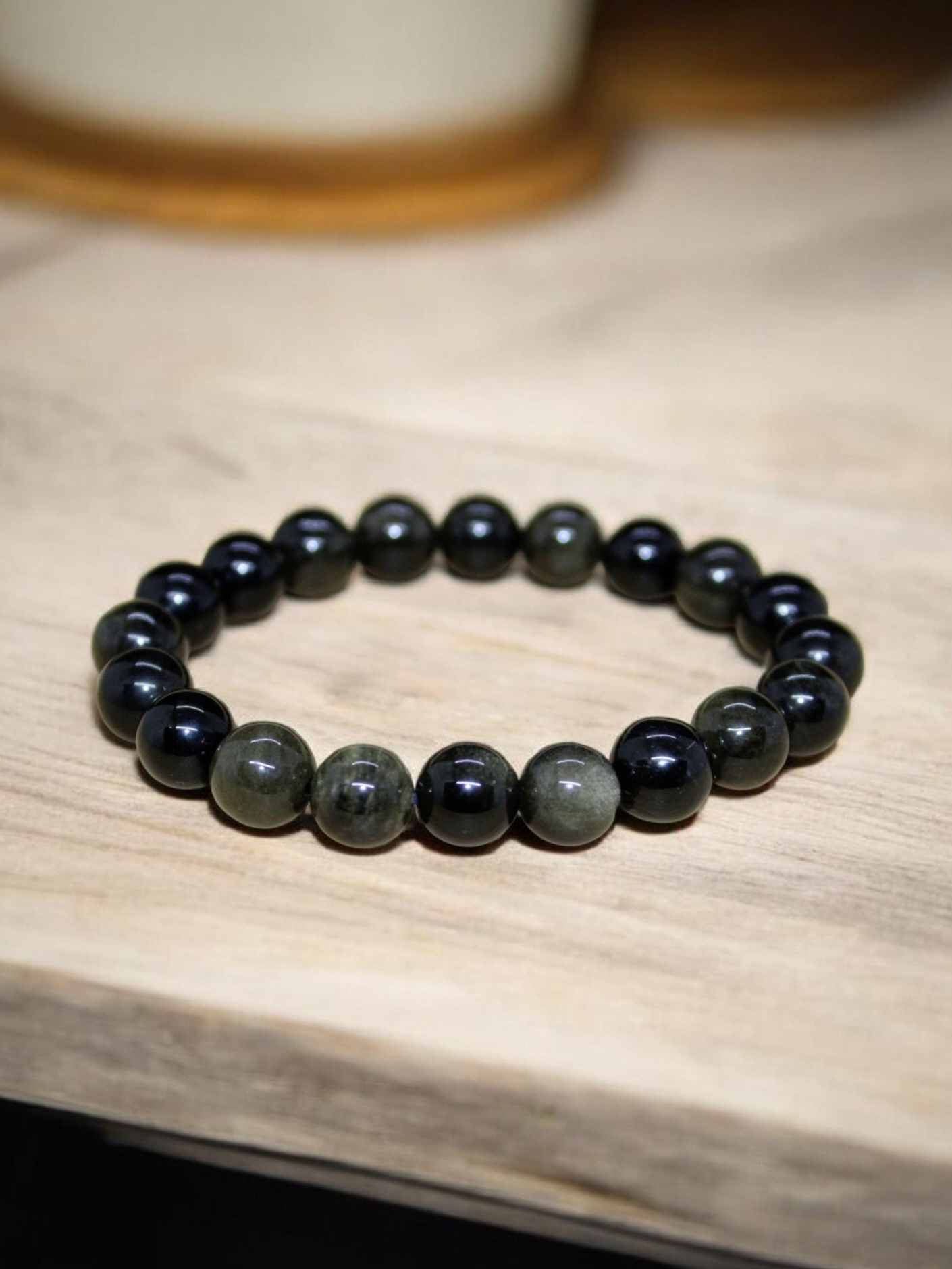 Bracelet Obsidienne dorée 10mm