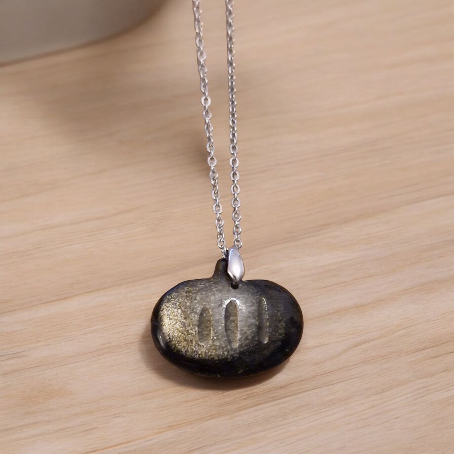 Pendentif Obsidienne dorée